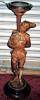 Pedestal, carved walnut Jester